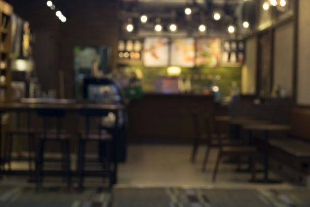 Cozy Coffee Shop with Blurred Background Cozy Coffee Shop with Blurred Background