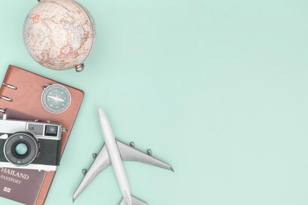 Retro Travel Gear on a Fresh Green Background Retro Travel Gear on a Fresh Green Background